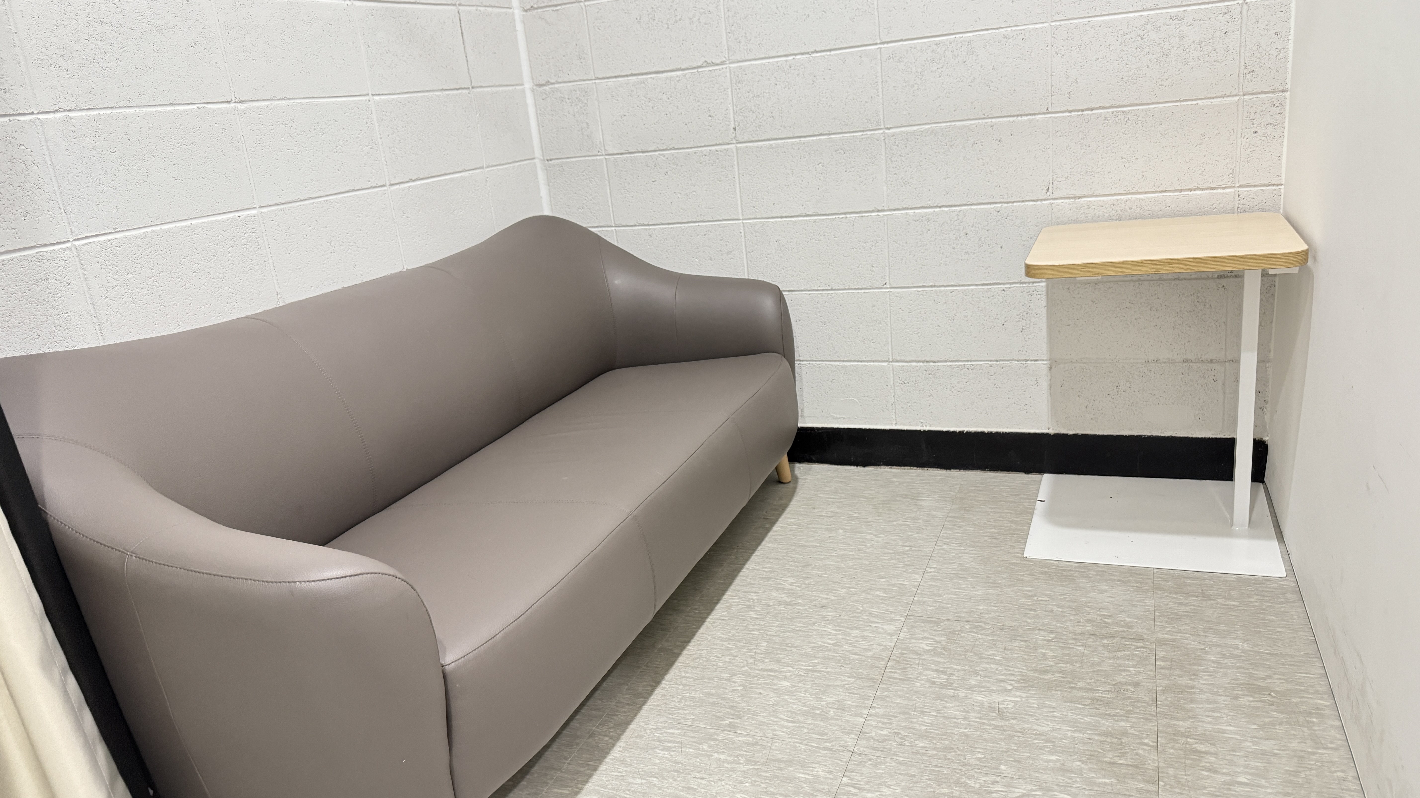 Sofa and Table Inside the Baby Care Room